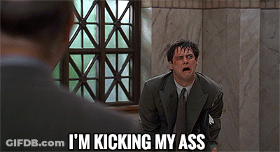 Man In Suit Kicking His Ass GIF