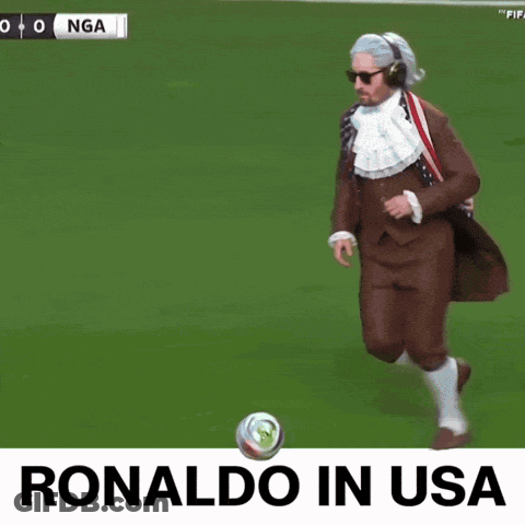 Man In Suit Kicking Soccer Ball Ronaldo In USA GIF