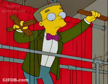 Man In Suit Kneeling GIF
