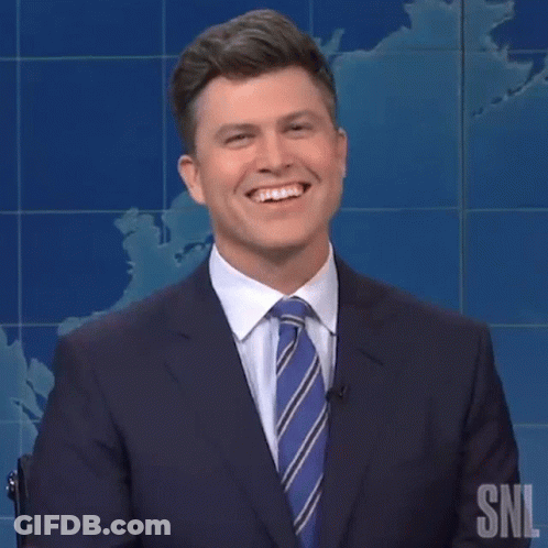 Man In Suit Laughing And Clapping GIF