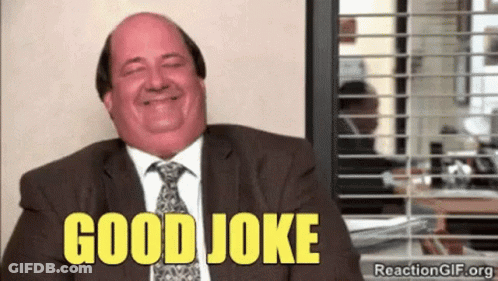 Man In Suit Laughing Saying Good Joke GIF