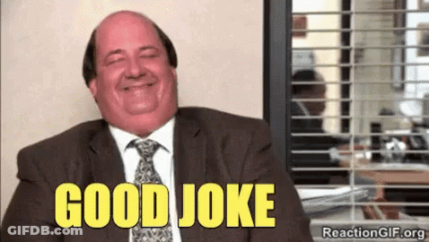 Man In Suit Laughing Saying Good Joke GIF