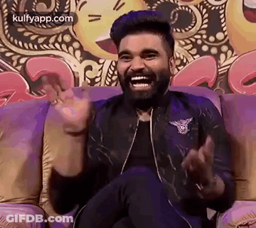 Man In Suit Laughing Saying Good Joke GIF
