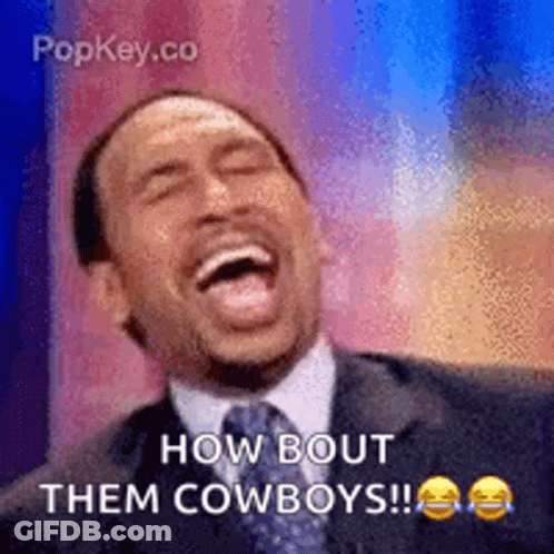 Man In Suit Laughing Saying How Bout Them Cowboys GIF