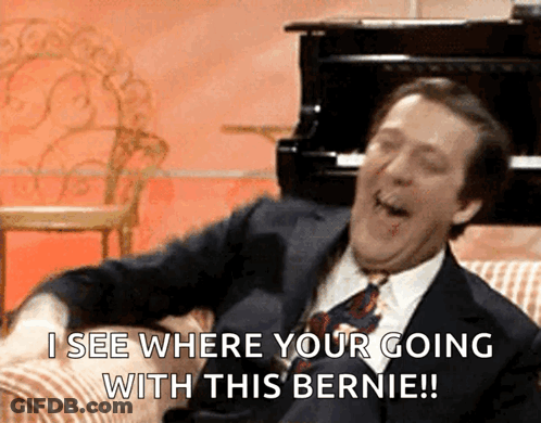 Man In Suit Laughing Saying I See Where You're Going With This Bernie GIF