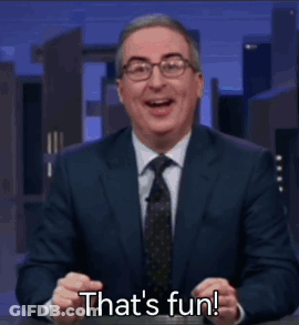Man In Suit Laughing Saying That's Fun GIF