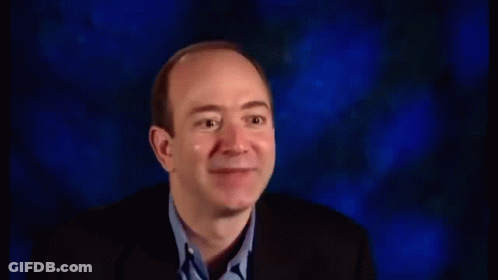 Man In Suit Laughing With Mouth Open GIF