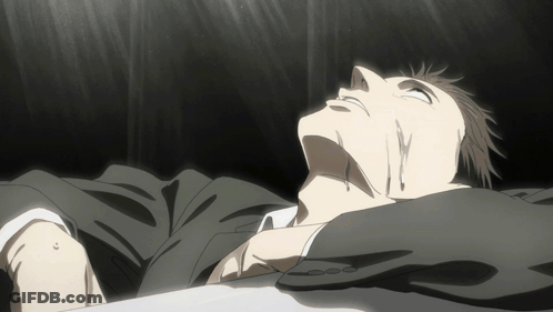 Man In Suit Laying Down With Bloody Nose GIF