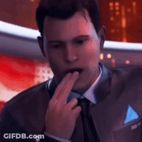 Man In Suit Licking His Lips GIF