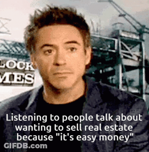 Man In Suit Listening To It's Easy Money GIF