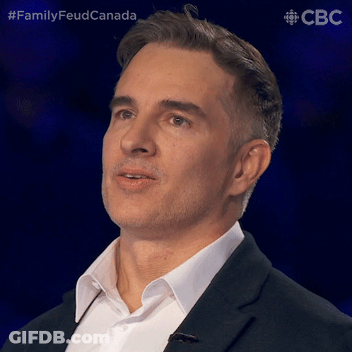 Man In Suit Looking At Camera Family Feud Canada GIF