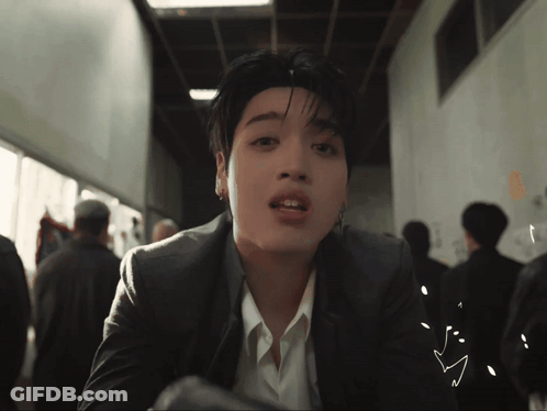 Man In Suit Looking At Camera Heart Drawing GIF