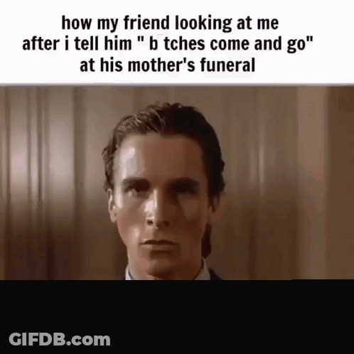 Man In Suit Looking At Camera GIF