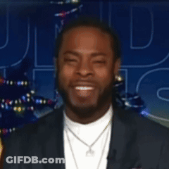 Man In Suit Looking At Camera With Letter D GIF