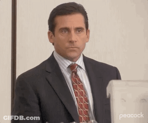 Man In Suit Looking At Computer Screen GIF