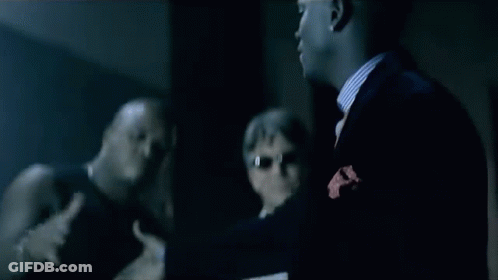 Man In Suit Looking At Mirror GIF