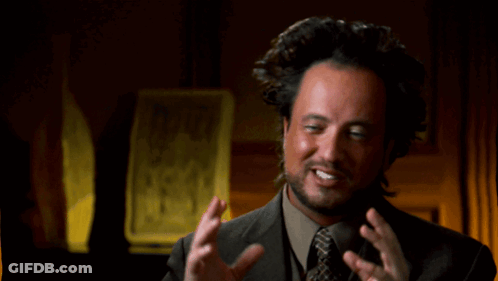 Man In Suit Looking At Phone GIF