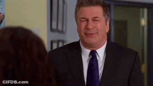 Man In Suit Looking At Woman GIF