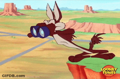 Man In Suit Looking Through Binoculars GIF