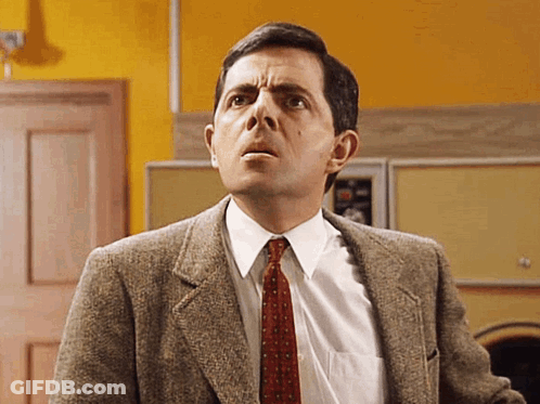 Man In Suit Looking Up GIF