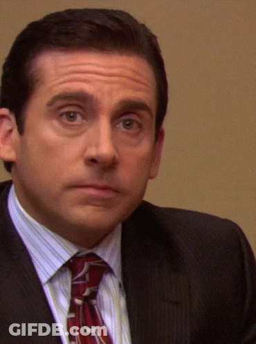 Man In Suit Making Face GIF