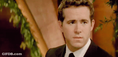 Man In Suit Making Face GIF