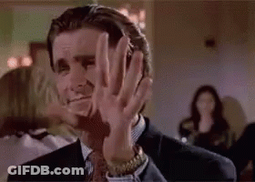 Man In Suit Making Face With Hands GIF