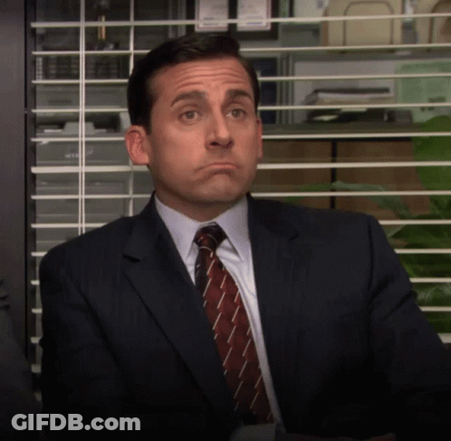 Man In Suit Making Face GIF