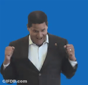 Man In Suit Making Fist GIF