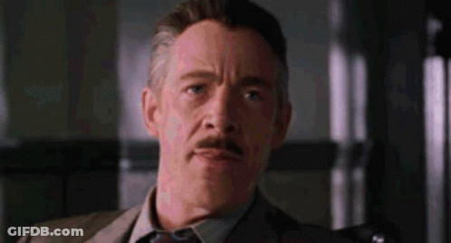 Man In Suit Making Funny Face GIF