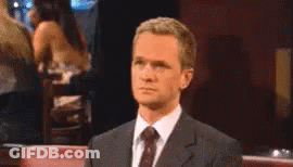 Man In Suit Making Funny Face GIF
