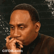 Man In Suit Making Funny Face GIF