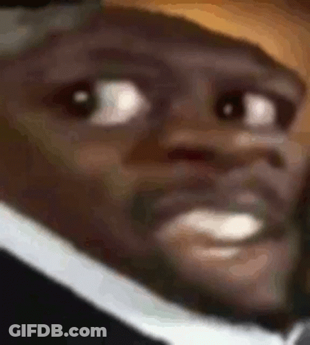 Man In Suit Making Funny Face GIF