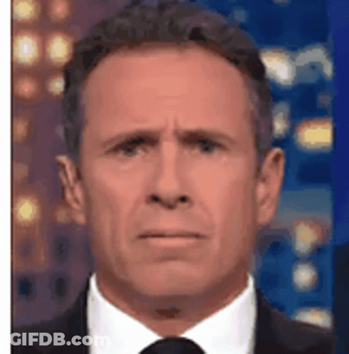 Man In Suit Making Funny Face GIF