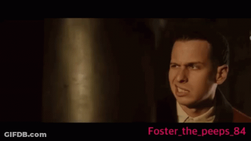 Man In Suit Making Funny Face GIF