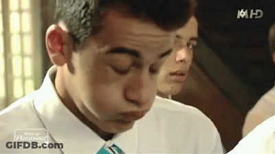Man In Suit Making Funny Face GIF