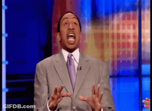 Man In Suit Making Funny Face GIF