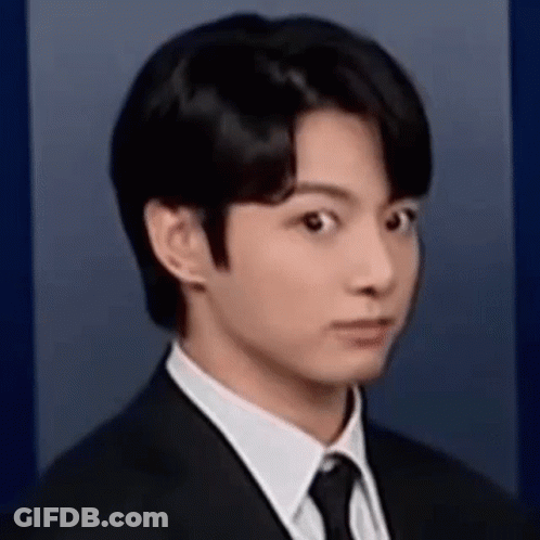 Man In Suit Making Funny Face GIF