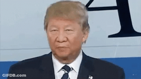 Man In Suit Making Funny Face GIF
