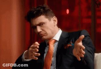 Man In Suit Making Funny Face GIF