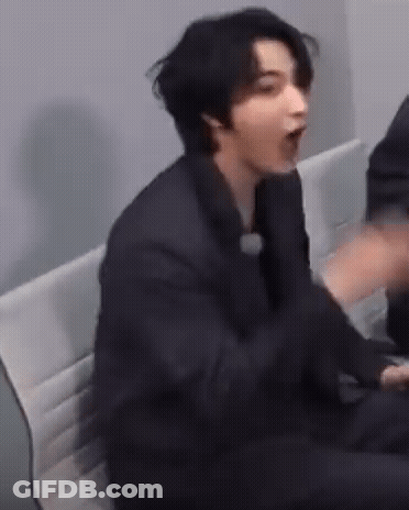 Man In Suit Making Funny Face GIF