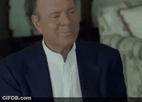 Man In Suit Making Funny Face GIF