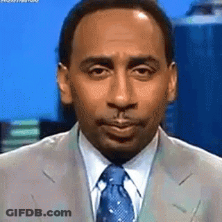 Man In Suit Making Funny Face GIF