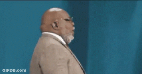 Man In Suit Making Funny Face GIF