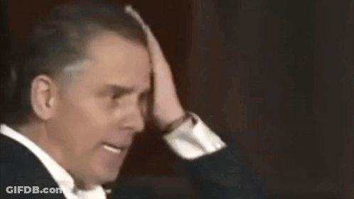 Man In Suit Making Funny Face And Waving GIF