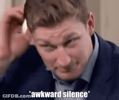 Man In Suit Making Funny Face Awkward Silence GIF