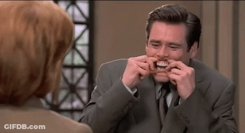 Man In Suit Making Funny Face GIF