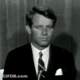 Man In Suit Making Funny Face GIF