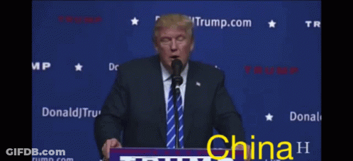 Man In Suit Making Funny Face China GIF