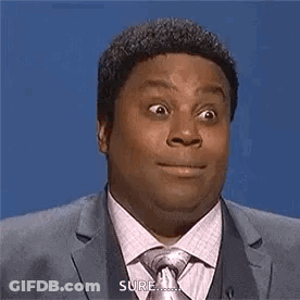 Man In Suit Making Funny Face GIF